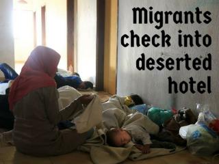 Migrants check into deserted hotel