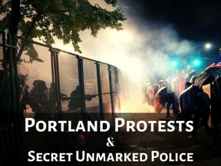 Federal law enforcement officers confront Portland protesters