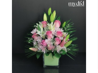 White lilies and pink roses vase