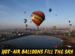 Hot-air balloons fill the sky