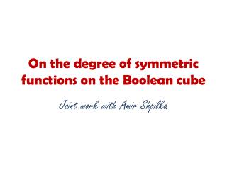 On the degree of symmetric functions on the Boolean cube
