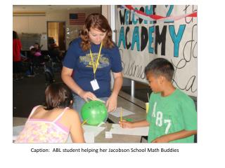 Caption: ABL student helping her Jacobson School Math Buddies