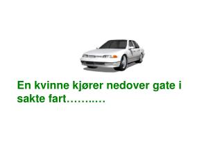 En kvinne kj ører nedover gate i sakte fart ……..…