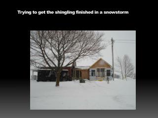 Trying to get the shingling finished in a snowstorm