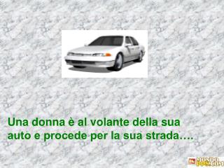 Una donna è al volante della sua auto e procede per la sua strada….