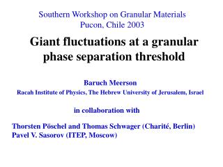 Giant fluctuations at a granular phase separation threshold