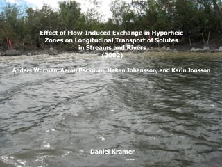 Effect of Flow-Induced Exchange in Hyporheic Zones on Longitudinal Transport of Solutes