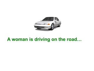 A woman is driving on the road…