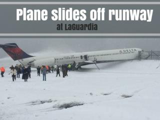 Plane slides off runway at LaGuardia