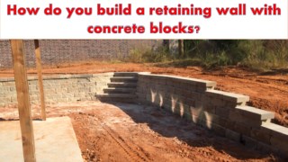 How do you build a retaining wall with concrete blocks?